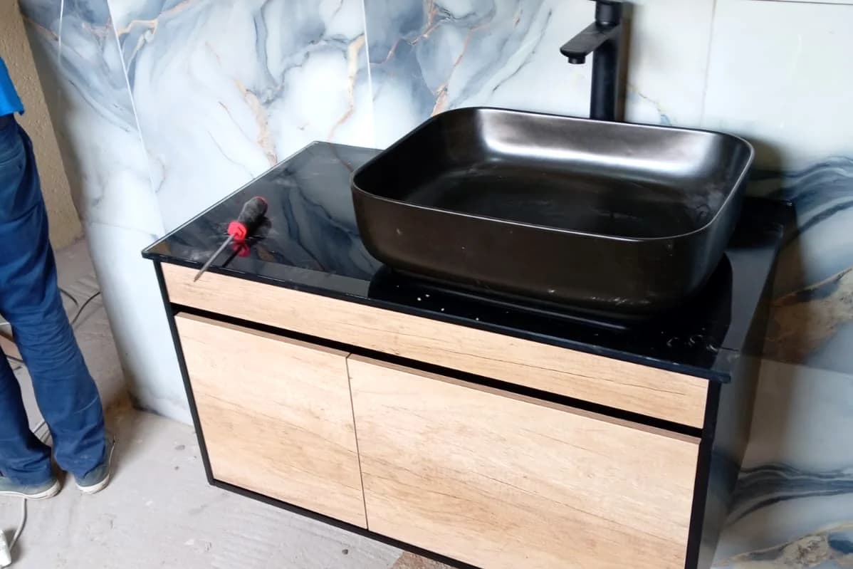 New vessel basin, mixer and vanity cabinet installed by Sniper Plumbing